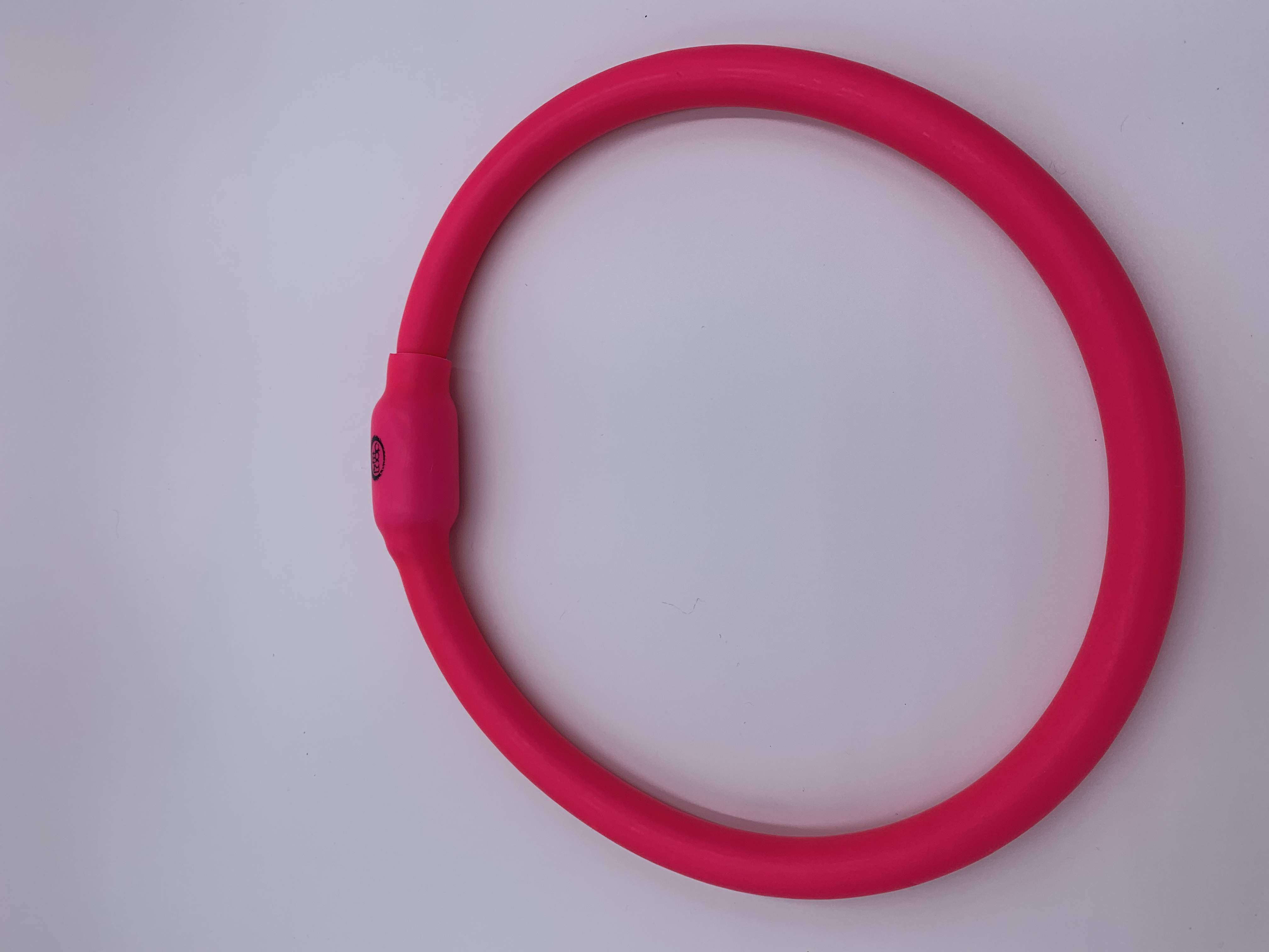 Red exercise ring for fitness, training, and resistance workouts. Perfect for active lifestyles.